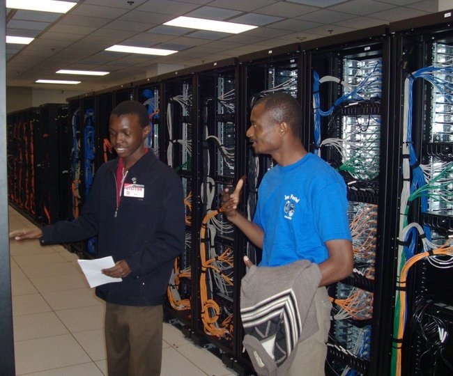 Coko Tracy & Patrick Okui, in the USC Data-Center, Los Angeles, CA. Coko Tracy & Patrick Okui, in the USC Data-Center, Los Angeles, CA.
